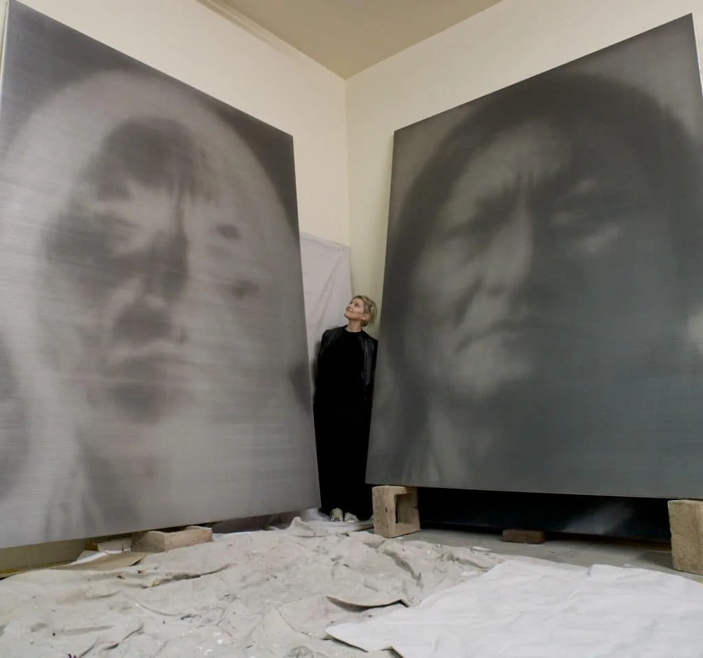 Alison Van Pelt in her Los Angeles studio with large-scale portrait paintings